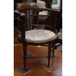 An Edwardian inlaid mahogany tub chair