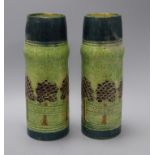 A pair of Dutch green glazed pottery vases height 30cm