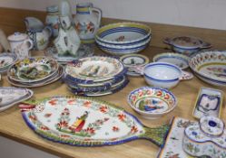 A large collection of Quimper pottery