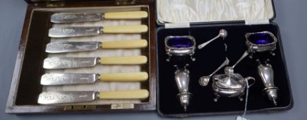 A five-piece silver cruet set (cased) and twelve pairs of plated fish eaters with bone handles in