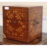 An inlaid four bottled decanter box