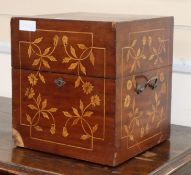 An inlaid four bottled decanter box