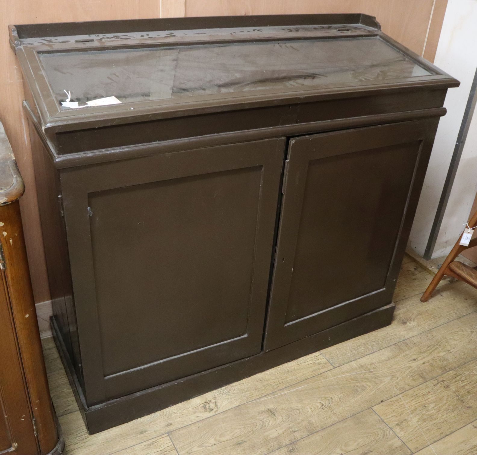 A Victorian green painted display top cabinet W.123cm