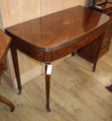 A George III Sheraton period inlaid mahogany tea table W.99cm