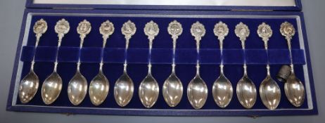 A set of twelve David Cornell silver 'Zodiac' spoons, cased, retailed by John Pinches, in fitted