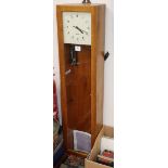 A Gents beech-cased electric Master clock (incomplete) H.129cm