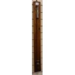 An oak stick barometer with ivory scales H.approx. 105cm