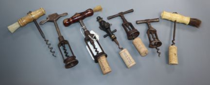 Seven 19th/20th century English corkscrews, including George Willet's 'The Surprise', another