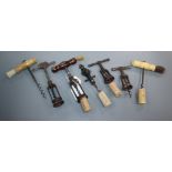 Seven 19th/20th century English corkscrews, including George Willet's 'The Surprise', another