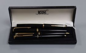 Two Montblanc fountain pen and ballpoint pen sets with one box.