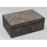 An Anglo-Ceylonese carved ebony box with ivory inlay, with specimen wood section lids to interior,