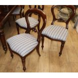 A set of eight Victorian style mahogany balloon back dining chairs