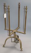 An 18th/19th century rotating brass plate warmer height 55cm