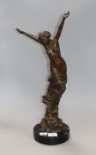 A bronze female nude, signed C. Ruben height 57cm