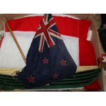 Three flags / pennants and a model boat