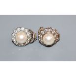 A pair of white metal, cultured pearl and diamond cluster set ear clips, 12mm.