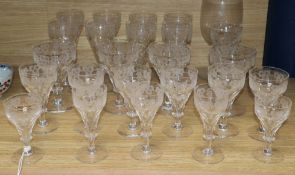 A suite of etched glass and another goblet