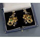 A pair of 18k, sapphire, ruby, emerald and diamond set foliate ear clips, 33mm.