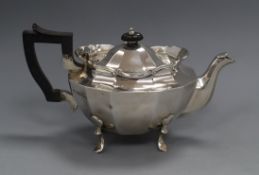 An Edwardian panelled silver teapot by Goldsmiths & Silversmiths Co Ltd, London, 1907, gross 11 oz.