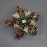 A 20th century Italian 750, diamond, ruby, sapphire and emerald set flower head brooch, 45mm.