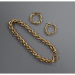 A 9ct gold ropetwist bracelet and a pair of similar earrings.