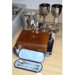 A collection of plated items and cased flatware, including a pair of King's College race trophies,