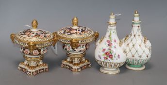 A pair of Derby pot pourri vases and a pair of Minton style pear shaped lidded vases (4) tallest