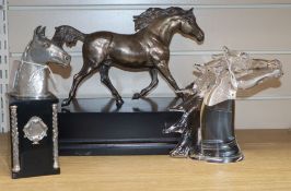 A pewter model of a running horse, another of a horse's head and a Murano glass horse's head (3)