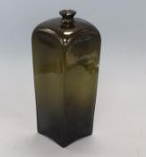 A tall late 18th century dark green glass wine bottle, of square section height 30cm