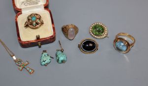 Two Middle Eastern yellow metal and gem set rings and a similar pendant, a 9ct ring two brooches and