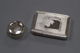 A late Victorian silver pill box, London, 1900 and later silver cigarette case, pill box 36mm.