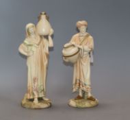 A pair of Royal Worcester blush water carriers