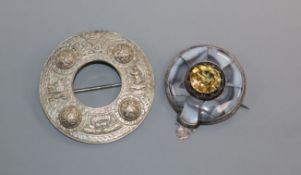 A white metal, Scottish hardstone and citrine set pendant brooch and one other brooch.