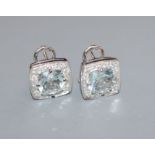 A pair of 750 white metal, pale aquamarine and diamond earrings of square form, 12mm.
