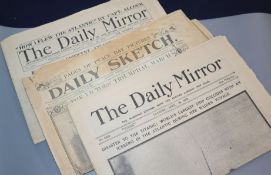 A collection of early to mid-20th century newspapers, including The Daily Mirror 'Disaster to the