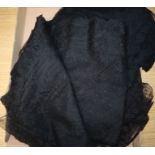 A black Chantilly lace mantilla, a lace stole, various lace bonnets, veils and a collar
