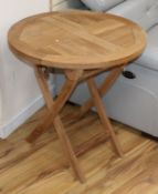 A teak folding garden table Diameter 60cm