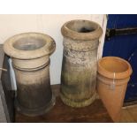 Three pottery chimney pots Tallest 78cm