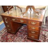 A late Victorian walnut pedestal desk W.122cm