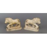 A pair of alabaster lions height 12cm
