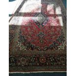 A Heriz style carpet 320 x 206cm