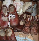 A collection of dolls / childrens shoes