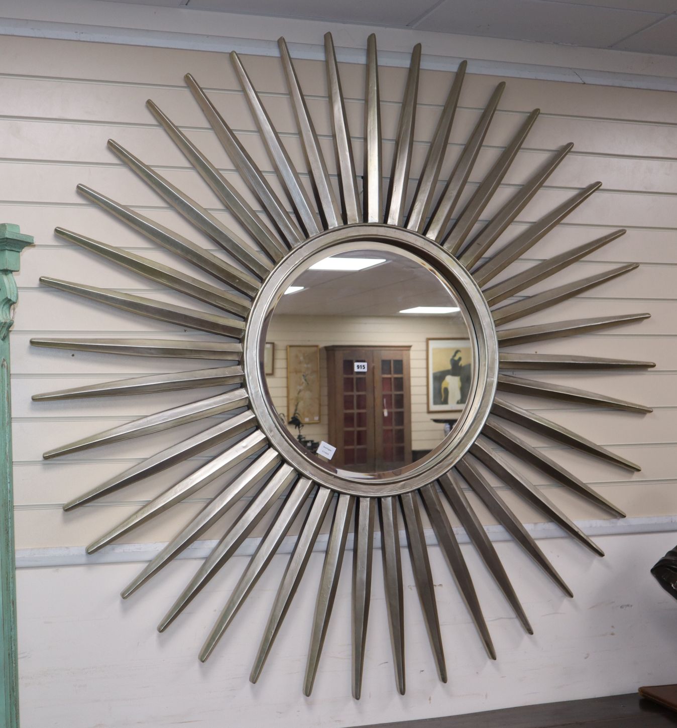 A large contemporary silvered starburst mirror Diameter 166cm