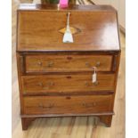 An Edwardian inlaid mahogany bureau