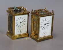 Two cased French brass carriage timepieces with alarm