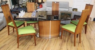 A Vemakoo plate glass topped teak extending dining table and six various teak dining chairs (7)