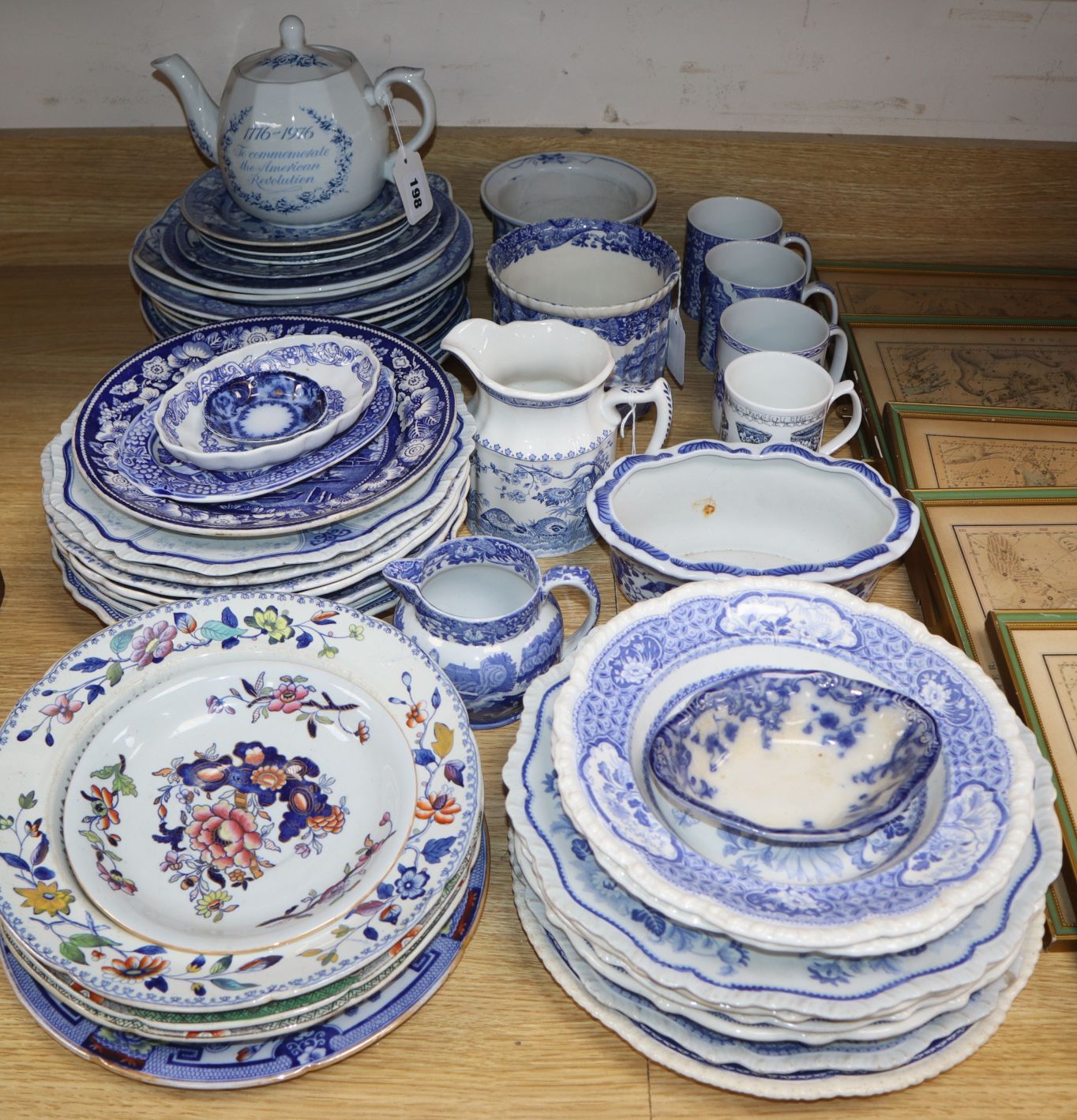 A large collection of 19th century and later blue and white china, including various plates and soup