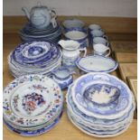 A large collection of 19th century and later blue and white china, including various plates and soup