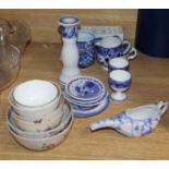 A Caughley Onion pattern pap boat, a collection of tea bowls and sundry small blue and white