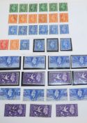 A collection of stamps in two albums, a stockbook and loose with mint and used Great Britain,